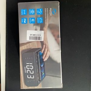 Multifunctional alarm clock, wireless changing station, Radio